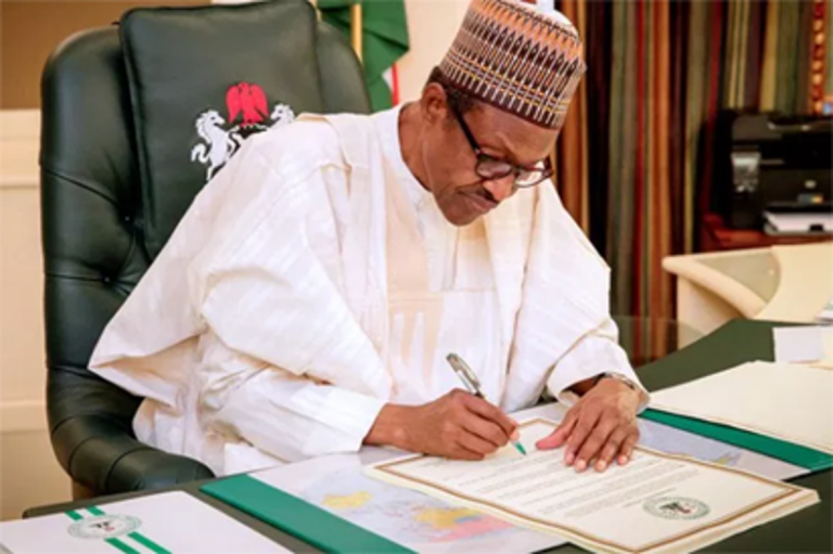 Buhari Signs PIB Into Law   