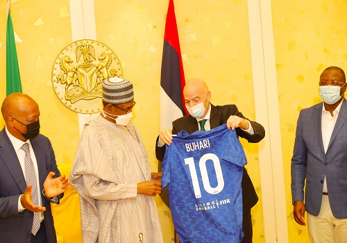 Buhari receives FIFA, CAF presidents at Aso Rock, gets No 10 jersey