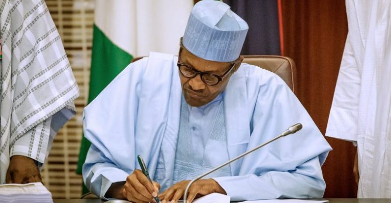 Buhari signs health insurance bill into law
