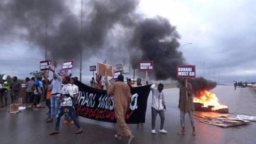 61st Independence: #BuhariMustGo protesters stage protest in Abuja